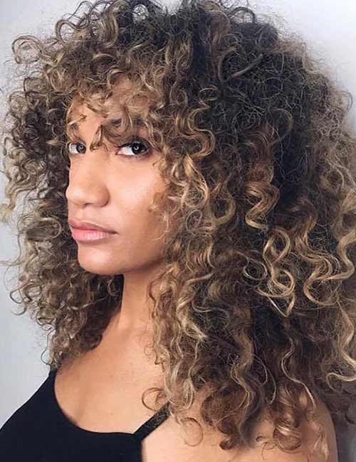 18. Blonde Tinted Brunette Curls
